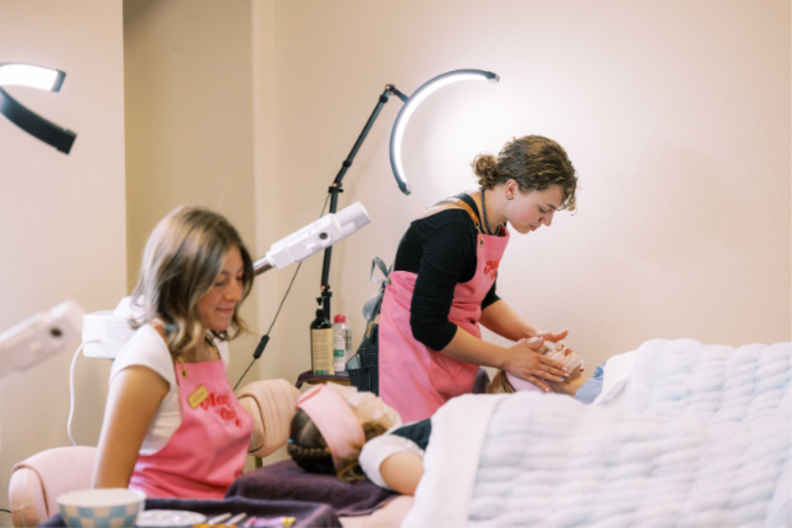 Pedicured feet resting over a bowl during a relaxing spa pedicure