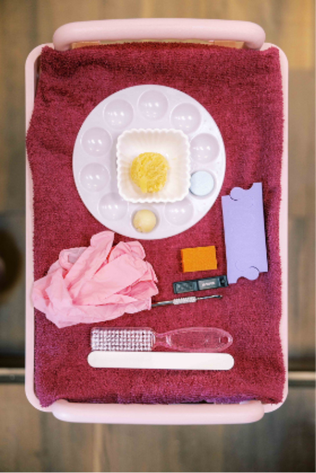 Paraffin pedicure with feet coated in warm orange wax for deep hydration